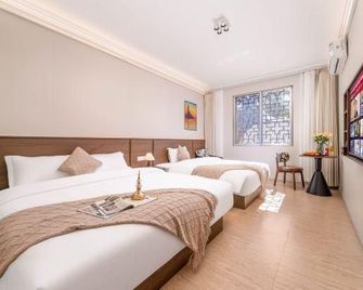 Good Friend Inn (Guilin Maternity and Child Bo'ai Hospital Baoxian Middle School Shop) - Guilin - Living room