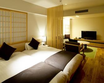 تاكاماتسو كوكوساي هوتل - تاكاماتسو - غرفة نوم