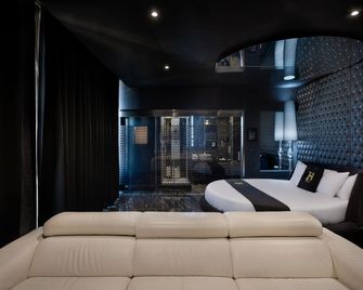 Hugo's Boutique Hotel - Adults Only - סנט ג'וליאנס - חדר שינה