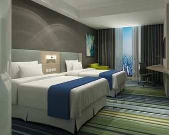 Holiday Inn Express Yingkou Onelong Plaza By IHG - Yingkou - Bedroom