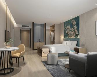 Magnotel Shiyan Fangxian Pedestrian Street - Shiyan - Bedroom