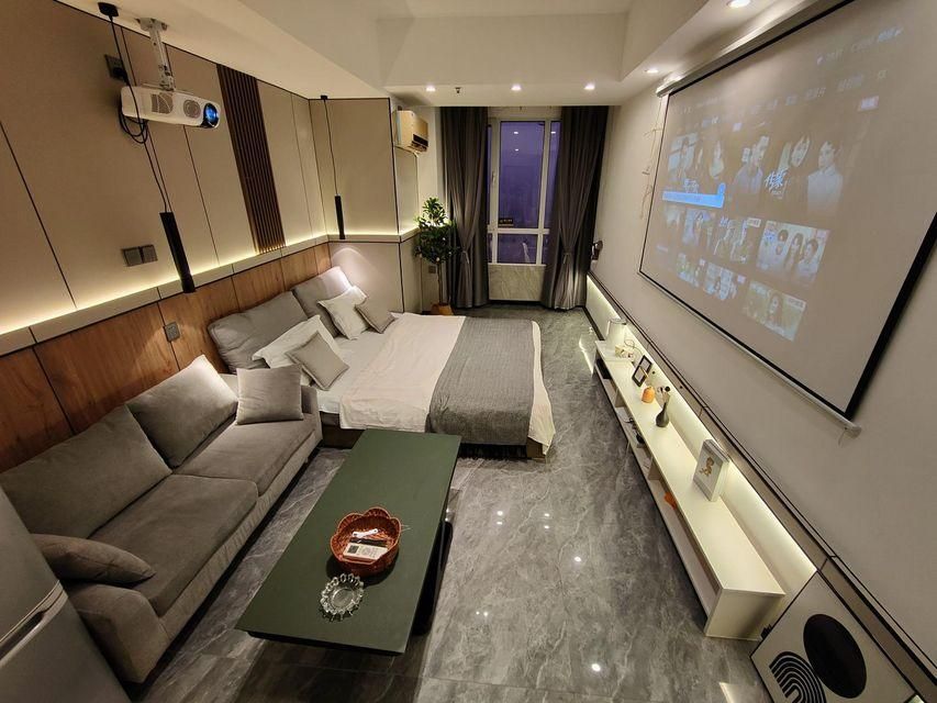 Qingdao Sea Stone Hotel Apartment - تشينغداو - غرفة نوم