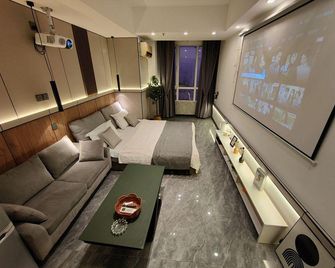Qingdao Sea Stone Hotel Apartment - Qingdao - Habitación
