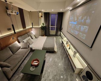 Qingdao Sea Stone Hotel Apartment - Qingdao - Kamar Tidur