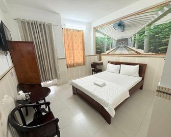 Khach San Nhu Y - Ho Chi Minh City - Bedroom