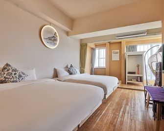 An Lan Jie Hostel - צ'יאי - חדר שינה