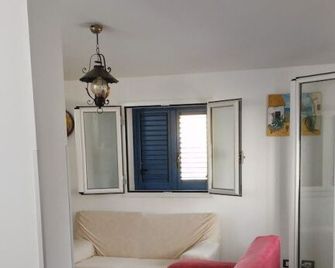 Villa Sunshine - Marinella - Huiskamer