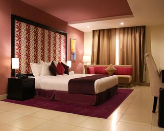 روز إن - الطائف - غرفة نوم