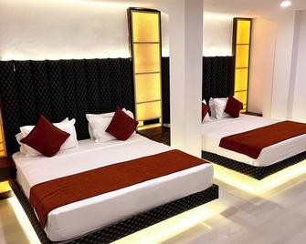 Sundaras Infinity Jungle Resort & Spa - Dambulla - Schlafzimmer