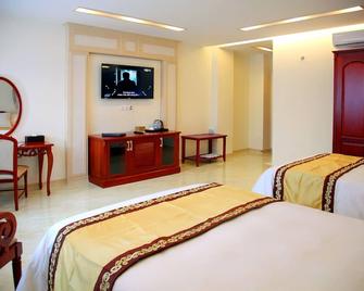 Minh Tam Phu Nhuan Hotel & Spa - הו צ'י מין סיטי - חדר שינה