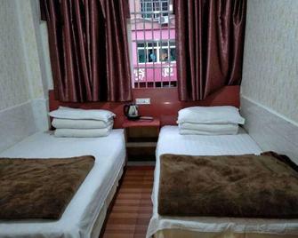 Linzhou Inn - Guang'an - Bedroom