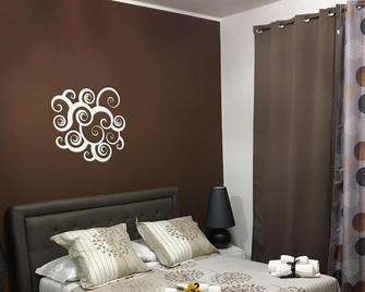 Symposium Bed&Breakfast - Catania - Camera da letto