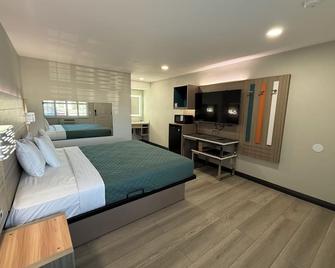 Courtesy Inn & Suites - Rosemead - Спальня