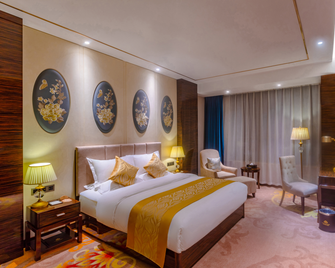Weifang World Expo International Hotel - Weifang - Bedroom