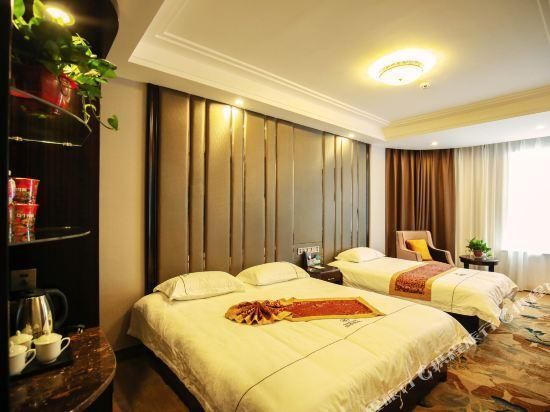 دونهاونغ سيزون بوتيك هوتل - جيوتشيوان - غرفة نوم