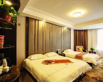 Dunhuang Season Boutique Hotel - Jiuquan - Bedroom