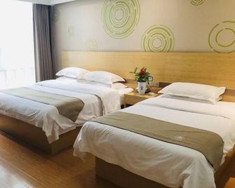 Greentree Inn Heze Danxian Shangmaocheng Business Branch - Heze - Спальня