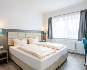 Familien- und Aparthotel Strandhof - Butjadingen - Schlafzimmer