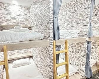 Economy Class Hostel - Taoyuan City - Bedroom