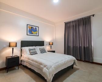 Stunning two bedroom apartment 306 in the hills overlooking Lake Victoria - Nakitoma - Habitación