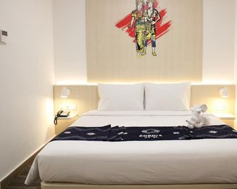 Cordia Hotel Banjarmasin - Hotel Dalam Bandara - Banjarbaru - Schlafzimmer