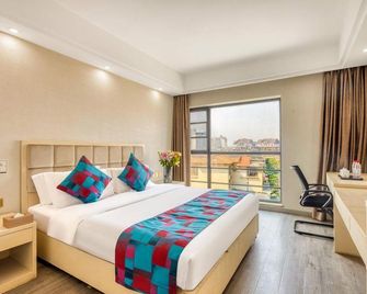 Jiangzhiyun Hotel - Xishuangbanna - Quarto