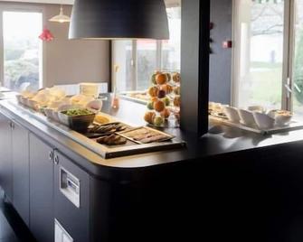 Hôtel Inn Design Laval - Laval - Buffet