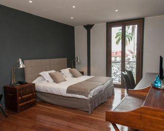 Hôtel des Palmistes - קיין - חדר שינה