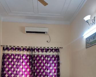 Raviz Inn - Kolkata - Bedroom