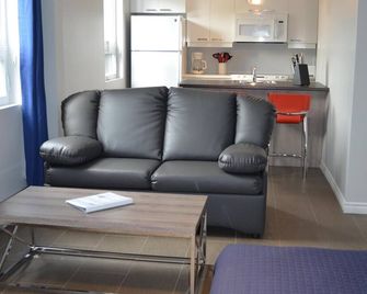 Loft with bed and sofa bed on the rue Principale (Le Chic-urbain) - Руйн - Вітальня