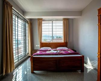 Cute Corner Homestay,Ooty - Ooty - Bedroom