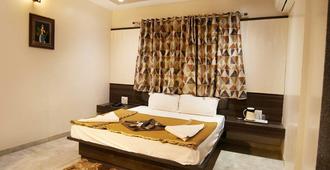 Hotel Sai Suraj Park - Shirdi - Bedroom