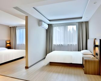 Home Inn (Hangzhou West Lake Hefang Street) - Ханчжоу - Спальня