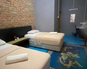 Naja Hotel - Bandar Permaisuri - Camera da letto