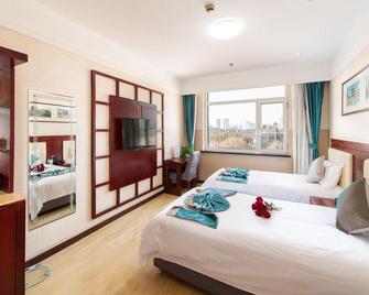 Kelong Hotel - Shenyang - Bedroom