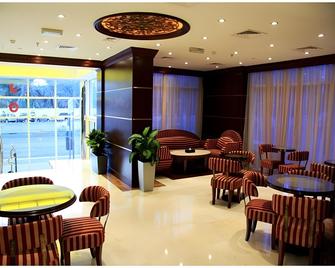 Trianon Royal Hotel - אבו דאבי - מסעדה