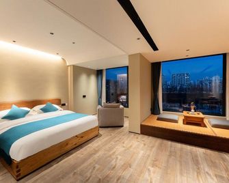 Tunxi Old Street in Mount Huangshan · Up Street Designer Homestay - Huangshan - Sypialnia