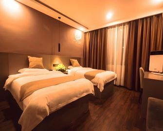Shell Hotel Zibo Bochuan District Pu Songling - Zibo - Habitación