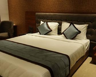 Alaukik Hotel - Shirdi - Slaapkamer