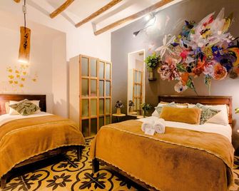 Niños Hotel Meloc - Cusco - Bedroom