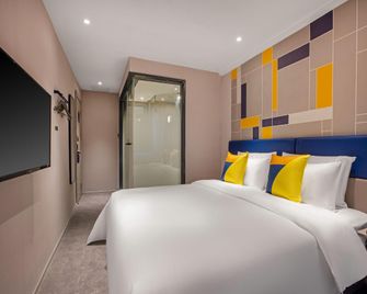 7 Days Inn Nanchang University Branch - נאנצ'אנג - חדר שינה