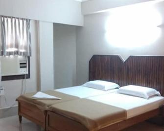 Hotel Shivam International - Nellore - Bedroom