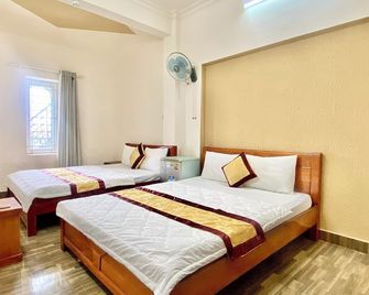 Duc Phuc Hotel - הו צ'י מין סיטי - חדר שינה