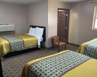 Economy Inn & Suites - Ashtabula - Habitación