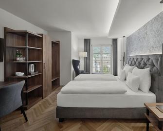Hotel Schwarzer Adler - Innsbruck - Bedroom
