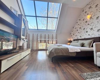 City center , studio apartment , 5 min to the sea - Palanga - Bedroom