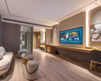 Orange Hotel Yancheng Yueda 889 Commercial Plaza - Yancheng - Wohnzimmer
