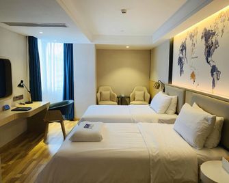 Kyriad Marvelous Hotel Shantou High-speed Railway Station - Shantou - Slaapkamer