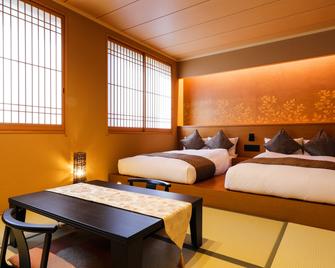Temple Town Hotel Waqoo Horyuji - Ando - Slaapkamer