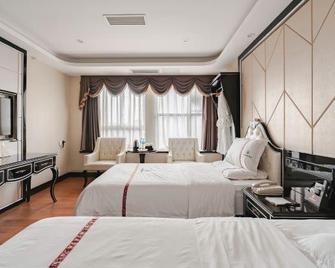 Tiancheng International Hotel (Neijiang Wanda High-speed Railway Station) - Neijiang - Спальня